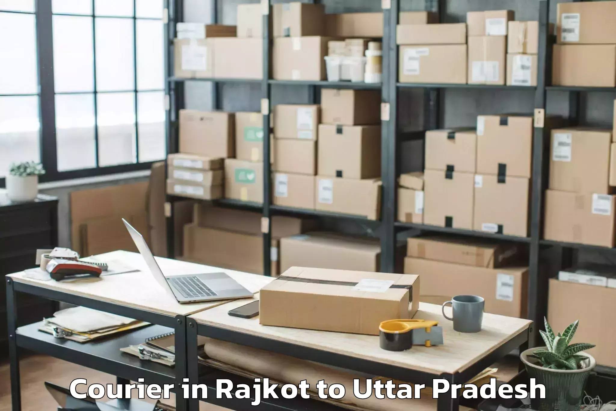 Book Rajkot to Js University Shikohabad Courier